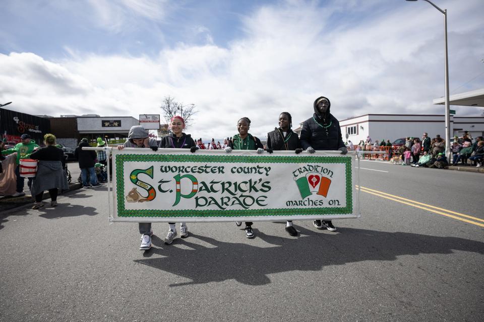 Marchers open the Worcester County St. Patrick’s Parade Sunday.