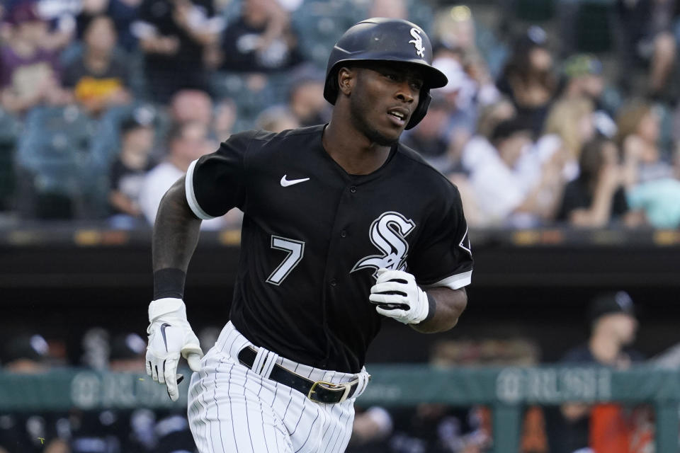 Chicago White Sox's Tim Anderson runs to first base after hitting a single during the first inning of a baseball game against the New York Yankees in Chicago, Saturday, May 14, 2022. (AP Photo/Nam Y. Huh)