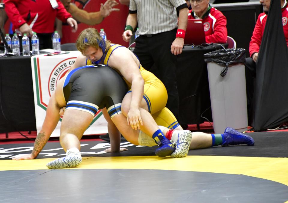 Lucas Stuerenberg, right, of Moeller picks up a Division I first-round victory at 285 pounds at the OHSAA 86th annual boys wrestling state tournament March 10-12, 2023.