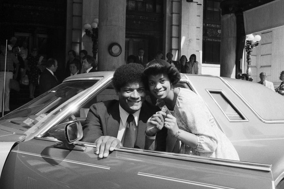 FILE - In this June 12, 1978, file photo, Wes Unseld and his wife Connie hold the keys to their new Thunderbird, presented to him by Sport magazine in New York. Unseld, the workmanlike Hall of Fame center who led Washington to its only NBA championship and was chosen one of the 50 greatest players in league history, died Tuesday, June 2, 2020, after a series of health issues, most recently pneumonia. He was 74. (AP Photo/Marty Lederhandler, File)