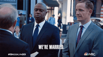 GIF from "Brooklyn Nine-Nine" saying, "We're married."