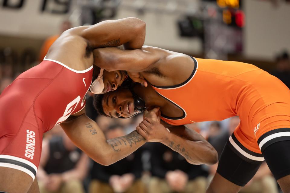 Feb 18, 2024; Stillwater, Okla, USA; Oklahoma StateÕs Jordan Williams wrestles OklahomaÕs Willie McDougald in the 149lbs match during a wrestling bout at Gallagher-Iba Arena in Stillwater, Okla. Mandatory Credit: Mitch Alcala-The Oklahoman