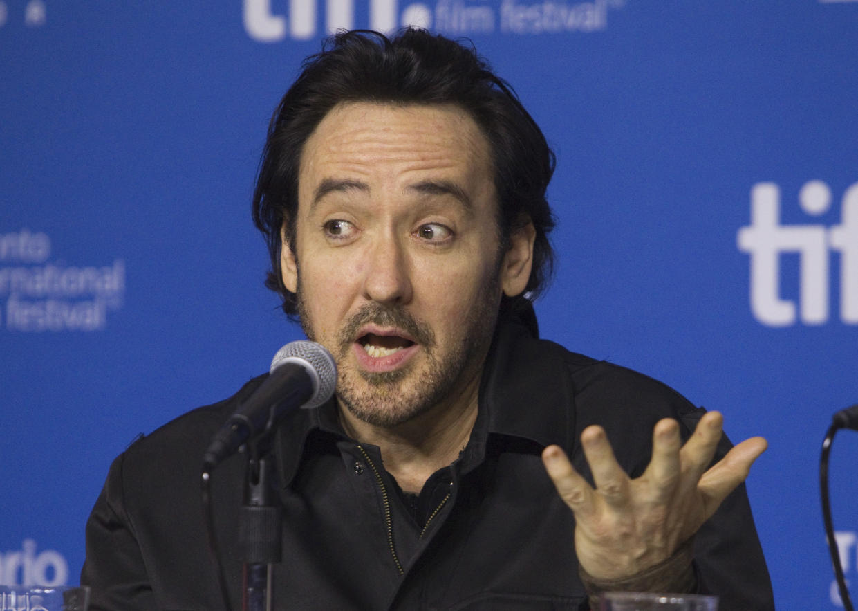 Actor John Cusack attends a press conference to promote the film 