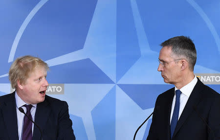 British Foreign Secretary Boris Johnson and NATO Secretary-General Jens Stoltenberg hold a joint news conference after their meeting at the Alliance headquarters in Brussels, Belgium, March 19, 2018. REUTERS/Stringer