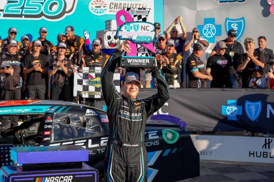 Oct 7, 2023; Concord, North Carolina, USA; NASCAR Xfinity Series driver Sam Mayer (1) celebrates his win during the Drive for the Cure 250 at Charlotte Motor Speedway Road Course.