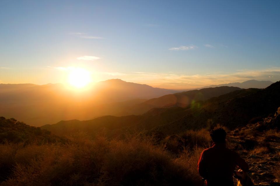 A sunset behind mountains