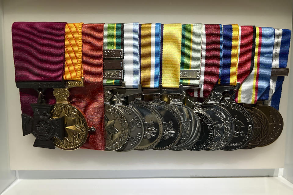 The Victoria Cross, left, and other medals awarded to Ben Roberts-Smith are on display at the Australian War Memorial in Canberra Australia, Friday, June 2, 2023. A judge concluded Roberts-Smith unlawfully killed prisoners and committed other war crimes in Afghanistan, in a ruling Thursday, June 1 dismissing Roberts-Smith's claims that he was defamed by media reports about his war service. (AP Photo/Rod McGuirk)