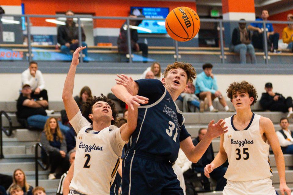 Copper Hills High School plays Crimson Cliffs High School during a boys basketball semifinal game of the Allstate Falcon Classic at Skyridge High School in Lehi on Friday, Dec. 8, 2023. | Megan Nielsen, Deseret News