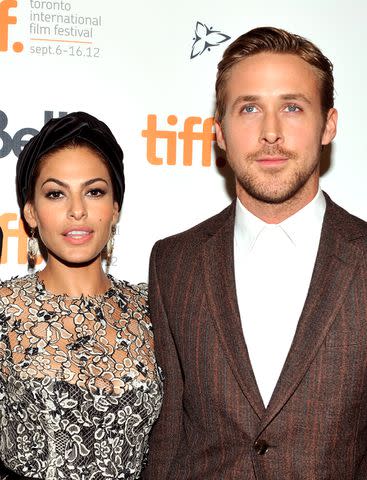 <p>Sonia Recchia/Getty</p> Eva Mendes and Ryan Gosling on September 7, 2012 in Toronto, Canada.