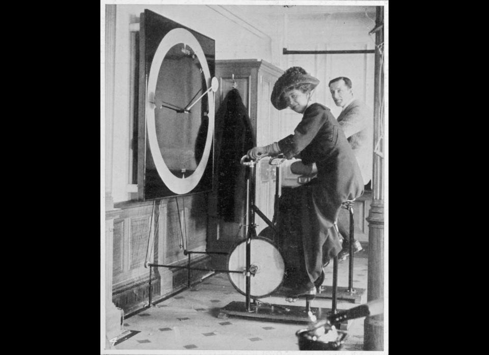 A woman keeps fit in the Titanic's gymnasium.