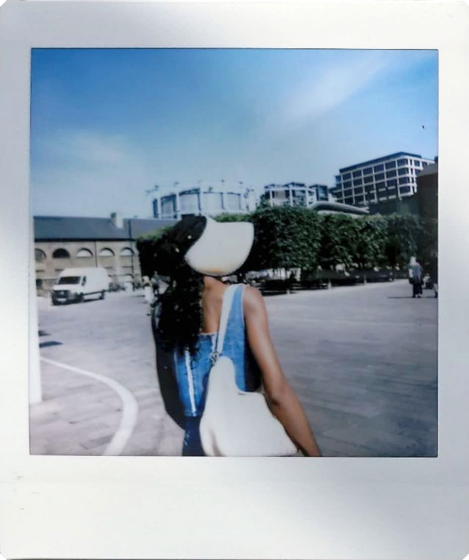 Digitized instant photo taken with the Fujifilm Instax SQ40 of London streets on a sunny day