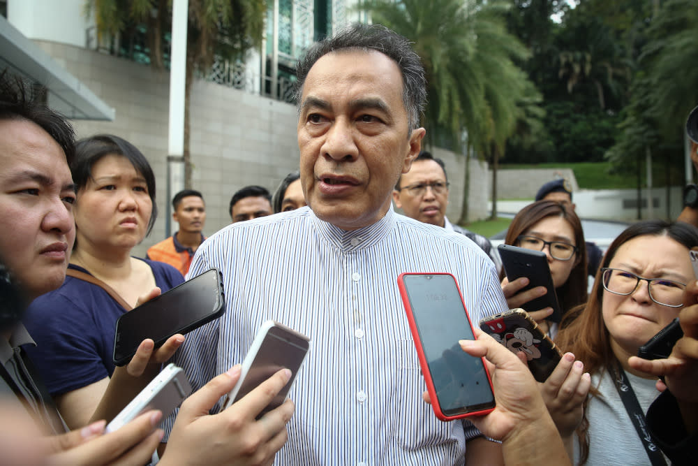 Datuk Husam Musa speaks to reporters outside the Yayasan Al-Bukhary in Kuala Lumpur February 29, 2020. — Picture by Yusof Mat Isa