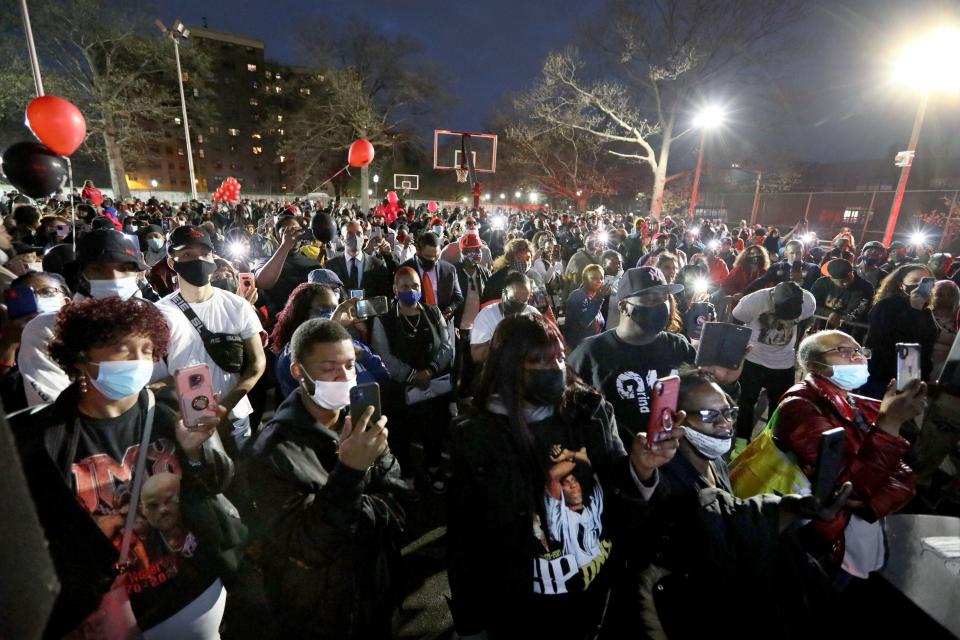 Hundreds attend a celebration of the life of Earl Simmons, the rapper know as DMX at the Fourth St. Park in Mount Vernon, N.Y., April 14, 2021. Simmons, who was born in Mount Vernon, died on April 9 at the age of 50 after suffering a heart attack. 