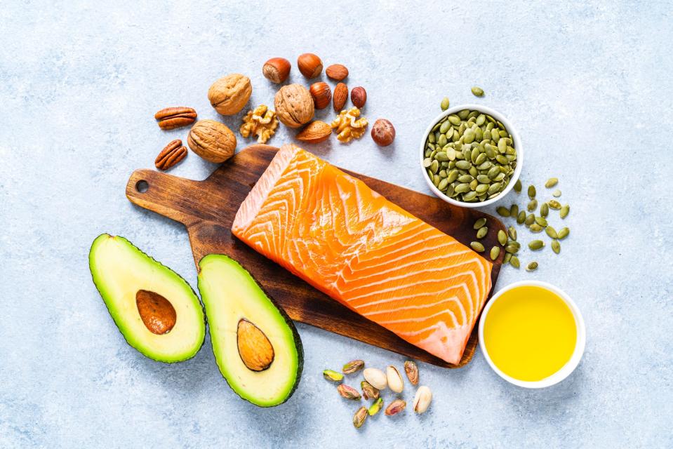 omega 3 rich foods, including salmon, avocado, walnuts