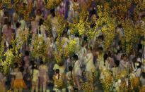 Performers take part in the closing ceremony for the 2014 Sochi Winter Olympics, February 23, 2014. REUTERS/Issei Kato (RUSSIA - Tags: OLYMPICS SPORT)