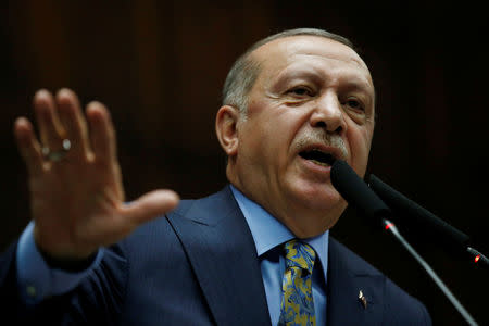 Turkish President Tayyip Erdogan addresses members of parliament from his ruling AK Party (AKP) during a meeting at the Turkish parliament in Ankara, Turkey, October 23, 2018. REUTERS/Tumay Berkin