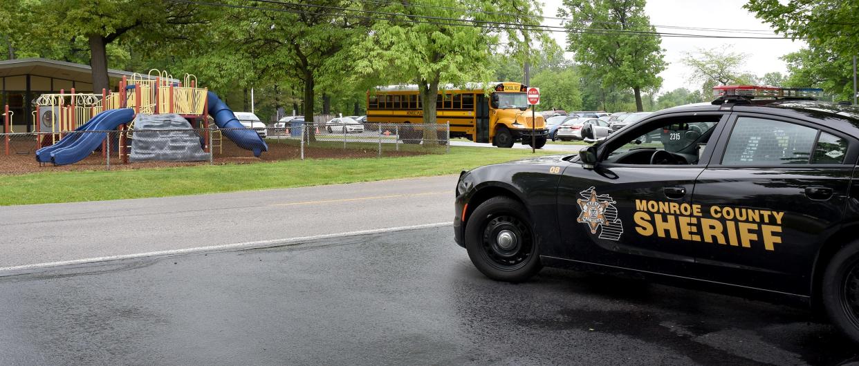 Monroe County Sheriff Sgt. Brian Quinn sat out front of Raisinville Elementary in Monroe Thursday morning as part of the department's county-wide effort to make law enforcement present at schools when students arrive in the wake of the tragic event at Robb Elementary School in Texas.