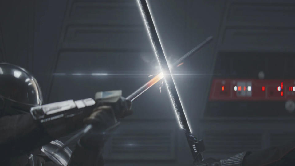 The Darksaber clashes against a beskar spear in The Mandalorian