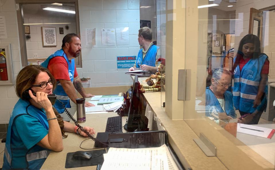 Crews setting up for the 10 a.m. opening at one of three shelters opening Wednesday morning in Brevard County. Volunteers are seen here at the Walter Butler Community Center shelter location in the Sharpes area between Cocoa and Port St. John.