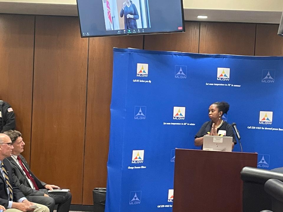 Activist Pearl Walker (right) addresses Tennessee Valley Authority CEO Jeff Lyash and TVA spokesman Buddy Eller (left) on Wednesday, Sept. 7, 2022.