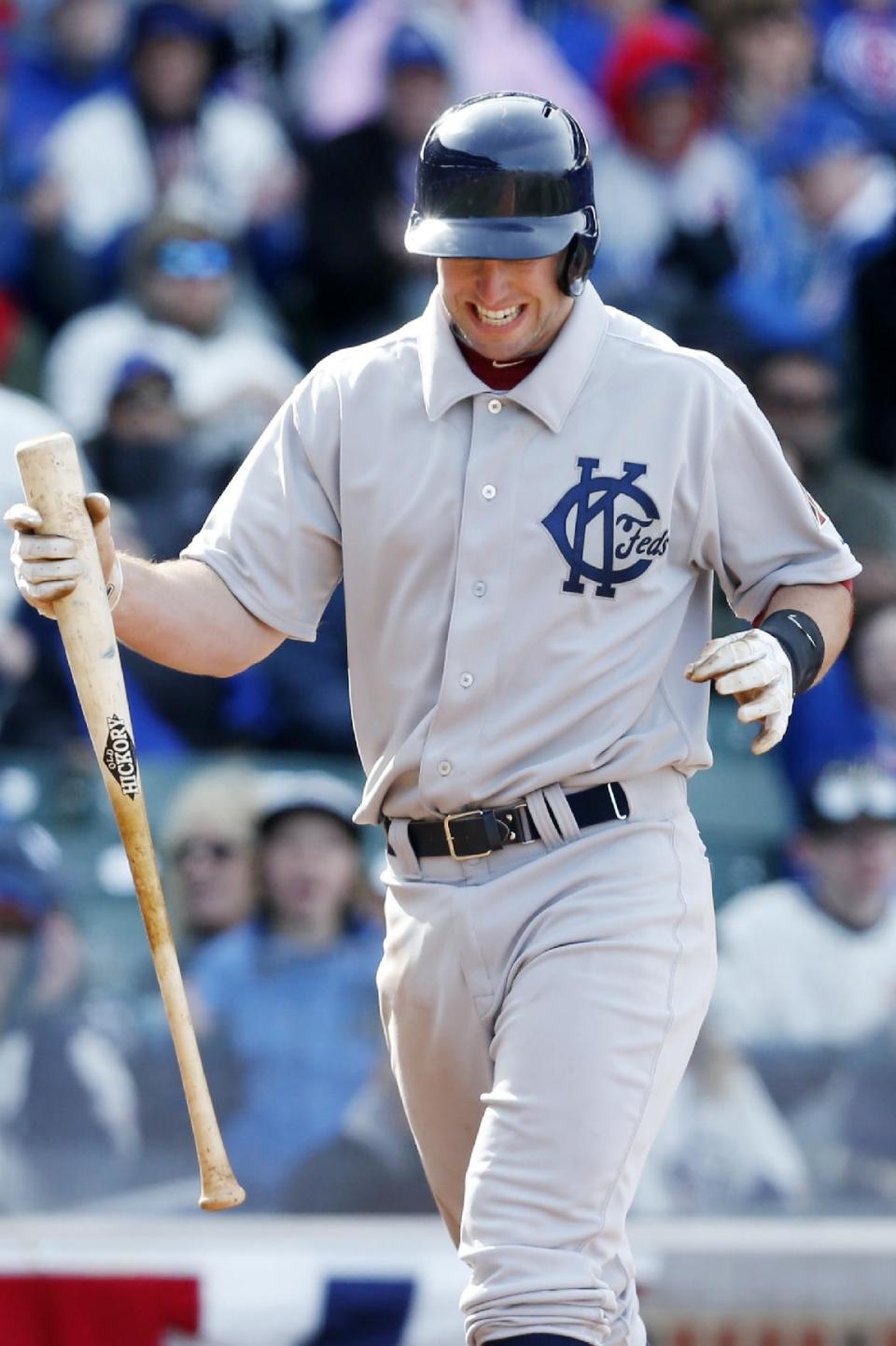 Arizona Diamondbacks' Paul Goldschmidt reacts after striking out against the Chicago Cubs during the ninth inning of a baseball game at Wrigley Field in Chicago, Wednesday, April 23, 2014. (AP Photo/Andrew A. Nelles)