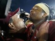 Florida Seminoles head coach Jimbo Fisher (L) celebrates with quarterback Jameis Winston after they defeated the Auburn Tigers to win the BCS Championship football game in Pasadena, California January 6, 2014. REUTERS/Lucy Nicholson