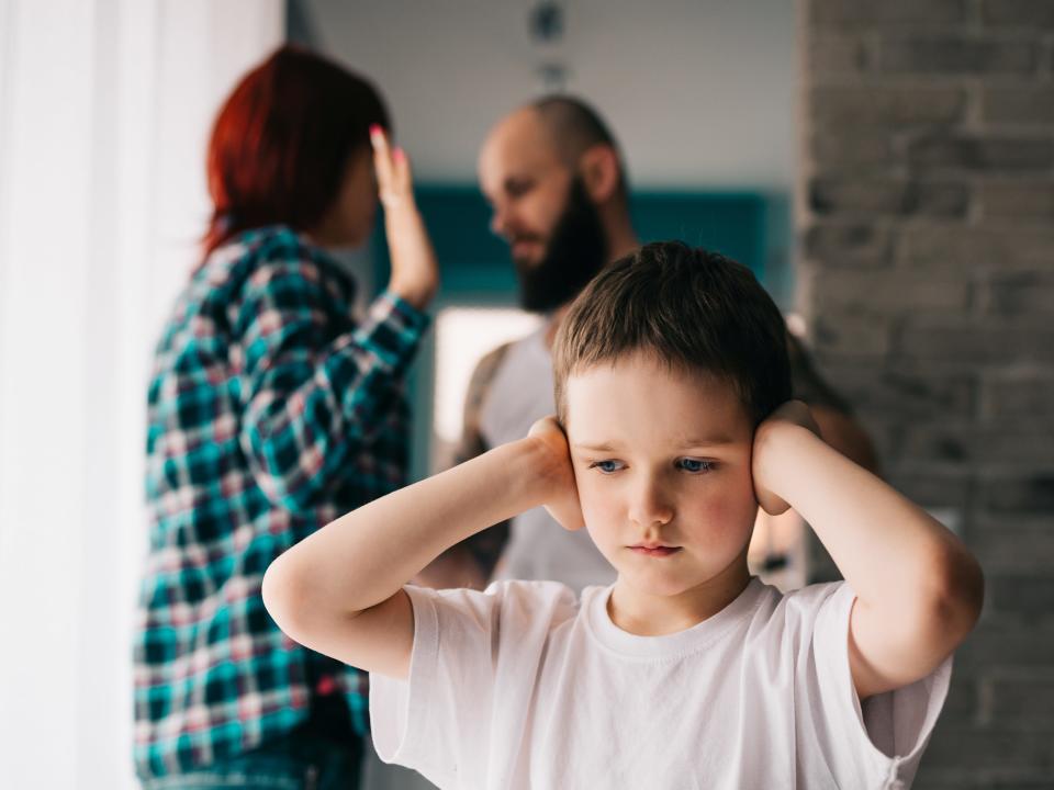 child sad parents fighting