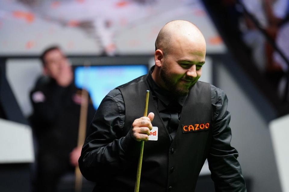 Luca Brecel in action during the final (PA)