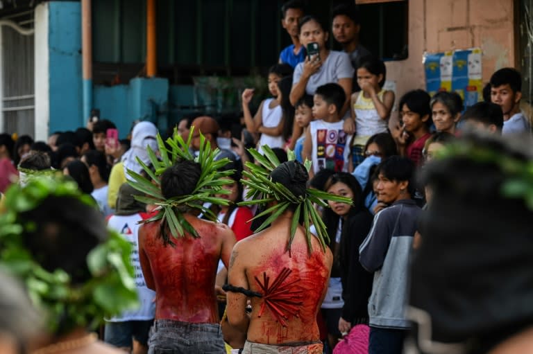 Hundreds gathered in villages around San Fernando city, north of Manila, to watch men punish themselves in a bid to atone for their sins or seek miracles from God (JAM STA ROSA)