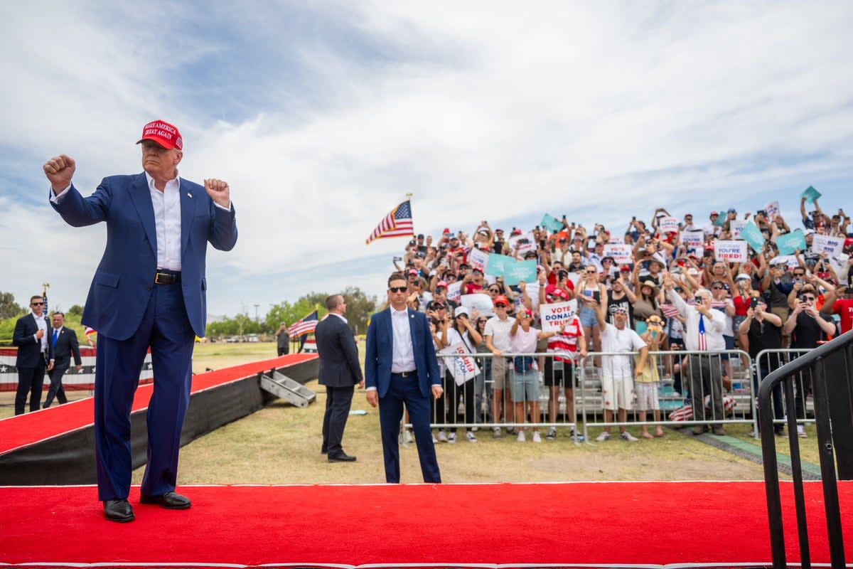 LAS VEGAS, NEVADA - JUNE 09: Republican presidential candidate, former U.S. President Donald Trump dances upon arrival at his campaign rally at Sunset Park on June 09, 2024 in Las Vegas, Nevada. (Photo by Brandon Bell/Getty Images) (Getty Images)