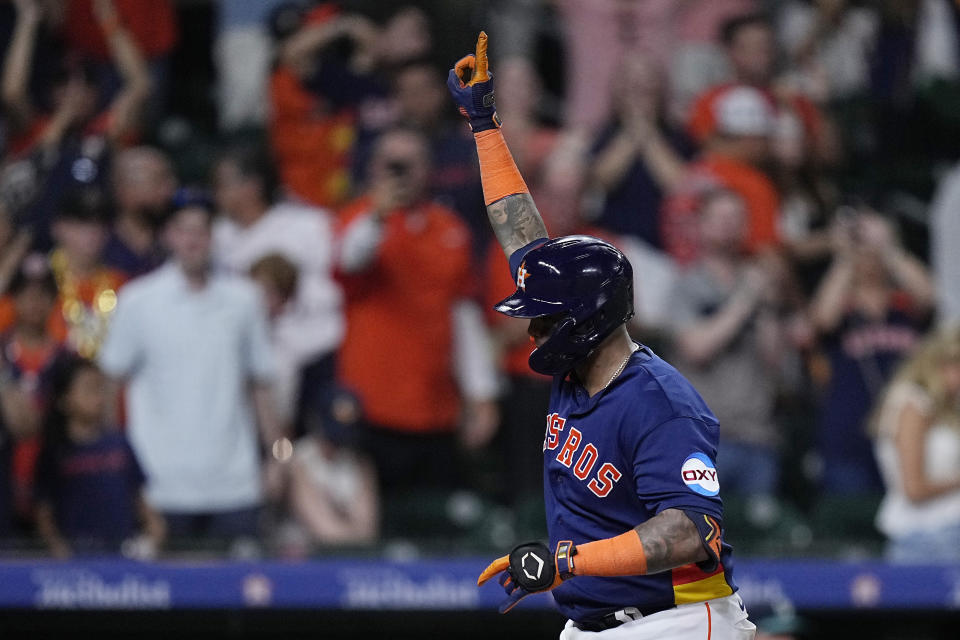 Houston Astros' Martin Maldonado celebrates after hitting a home run against the Seattle Mariners during the eighth inning of a baseball game Saturday, July 8, 2023, in Houston. (AP Photo/Kevin M. Cox)