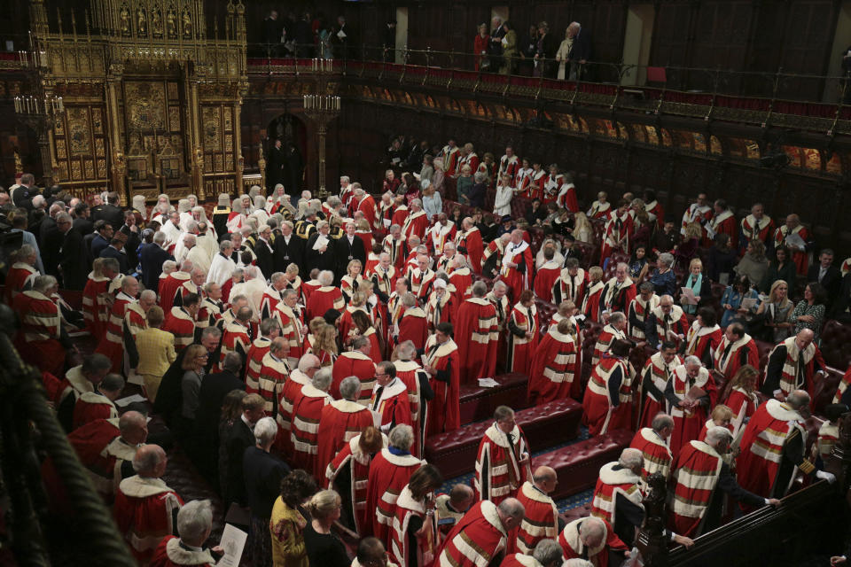 Members of the House of Lords and guests in the chamber ahead of the State Opening of Parliament by Queen Elizabeth II, in London, Thursday Dec. 19, 2019. Queen Elizabeth II formally opened a new session of Britain's Parliament on Thursday, with a speech giving the first concrete details of what Prime Minister Boris Johnson plans to do with his commanding House of Commons majority. (Aaron Chown, Pool via AP)