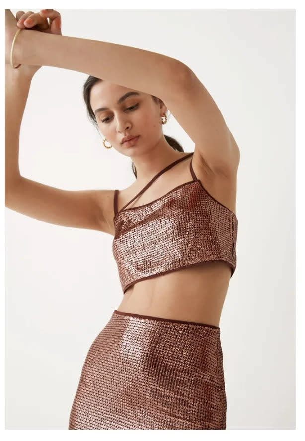 A model wears & Other Stories Asymmetric Sequin Crop Top