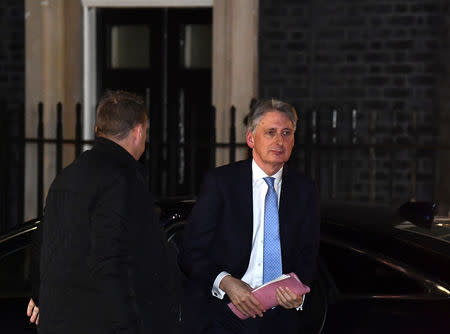 Britain's Chancellor of the Exchequer Philip Hammond arrives in Downing Street after the result was announced on Prime Minister Theresa May's Brexit deal, in London, Britain, January 15, 2019. REUTERS/Clodagh Kilcoyne
