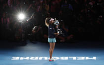 Tennis - Australian Open - Women's Singles Final - Melbourne Park, Melbourne, Australia, January 26, 2019. Japan's Naomi Osaka poses with the trophy after winning her match against Czech Republic's Petra Kvitova. REUTERS/Aly Song