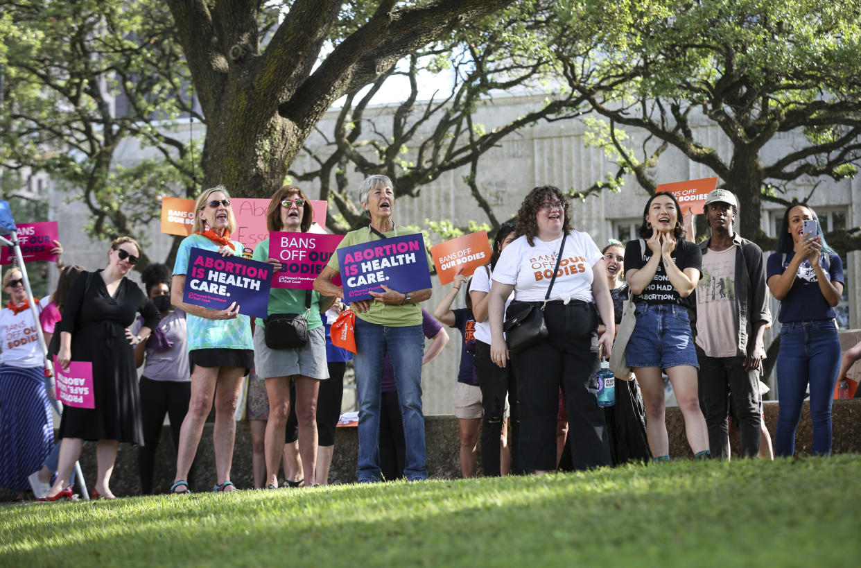People demonstrate in support of abortion rights near City Hall in Houston on Tuesday. (Jon Shapley/Houston Chronicle via AP)
