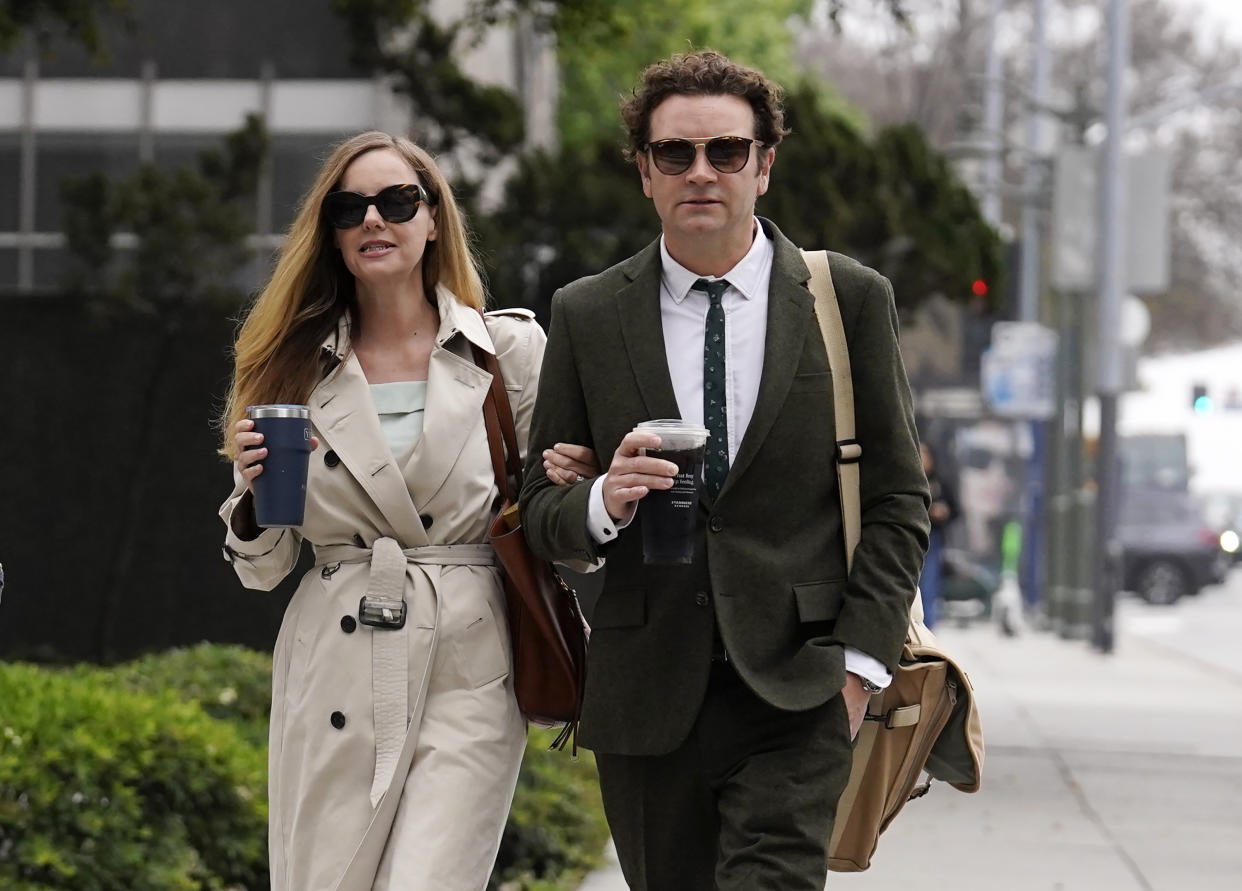 Danny Masterson and estranged wife Bijou Phillips arrive for closing arguments in his second rape trial on May 16, 2023, in Los Angeles. 