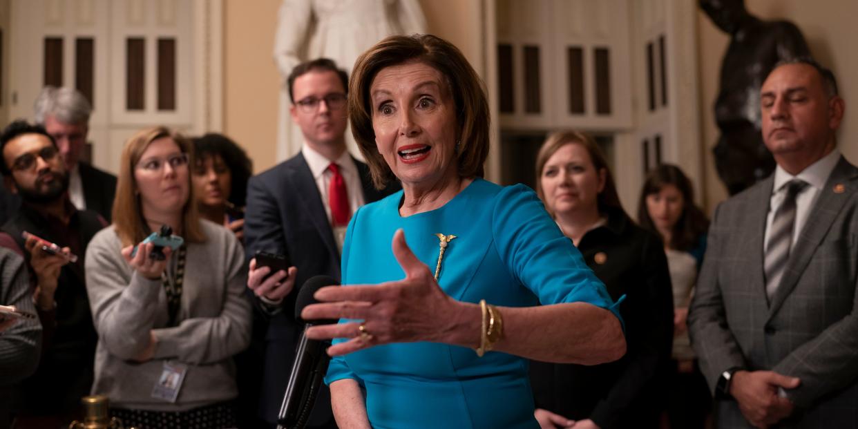 Speaker of the House Nancy Pelosi, D-Calif., makes a statement ahead of a planned late-night vote on the coronavirus aid package deal at the Capitol in Washington, Friday, March 13, 2020. (AP Photo/J. Scott Applewhite)