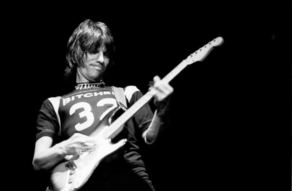 Jeff Beck playing the guitar