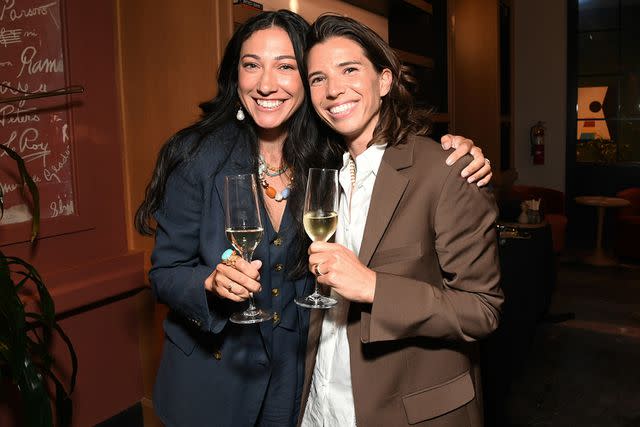 <p>Jon Kopaloff/Getty Images</p> Christen Press and Tobin Heath