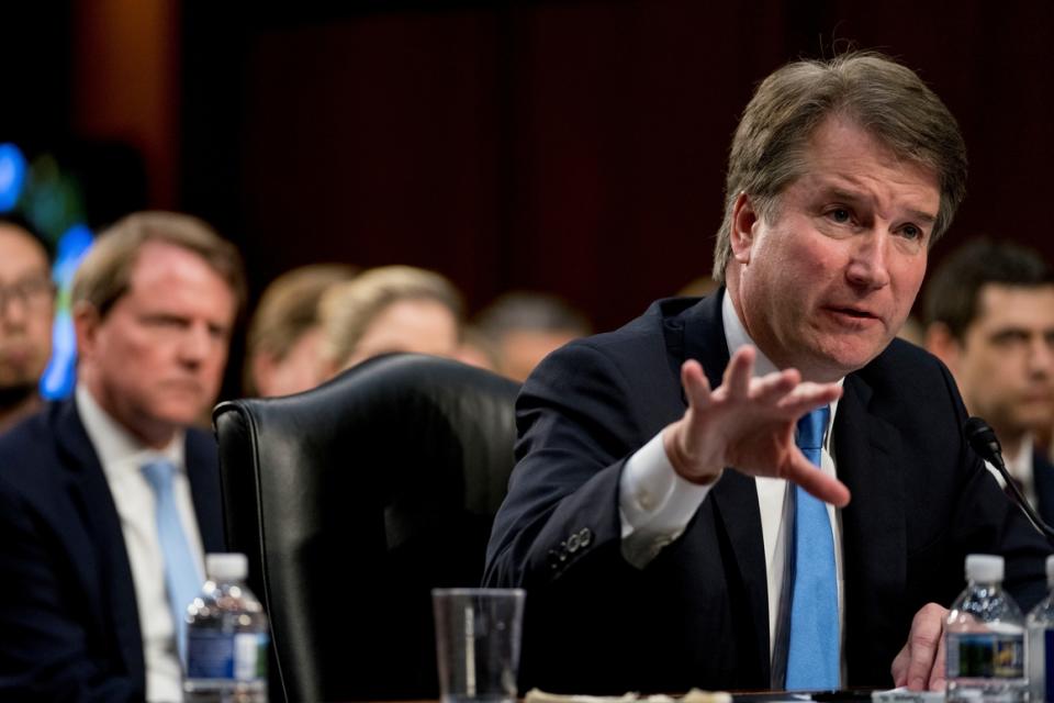 Donald McGahn listens as Supreme Court nominee Brett Kavanaugh testifies before the Senate Judiciary Committee on Sept. 5, 2018.  