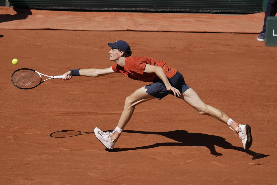 Italy's Jannik Sinner plays a shot against Spain's Carlos Alcaraz during their semifinal match of the French Open tennis tournament at the Roland Garros stadium in Paris, Friday, June 7, 2024. (AP Photo/Christophe Ena)