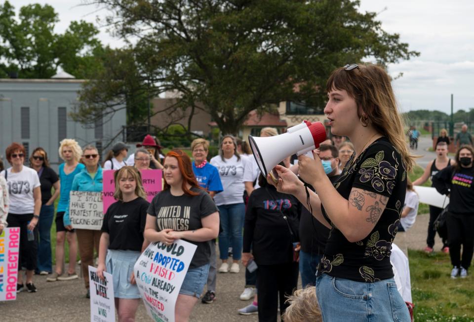 Organizer Elizabeth Bowers addresses the crown during the Rally for Abortion Rights held at the Four Freedoms Monument in Evansville, Ind., Sunday afternoon, May 22, 2022.