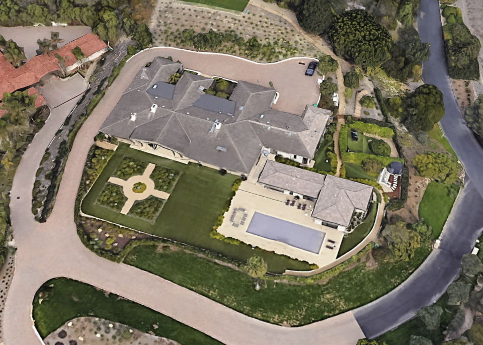 Sited on a Summerland hilltop, the 5-acre estate has a long driveway with room for upwards of a dozen cars.