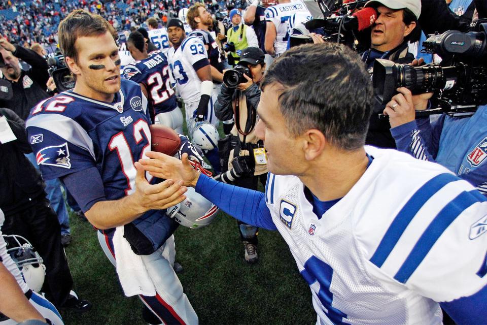 Mandatory Credit: Photo by Charles Krupa/AP/Shutterstock (6024303aj) Tom Brady, Adam Vinatieri New England Patriots quarterback Tom Brady (12) shakes hands with Indianapolis Colts kicker Adam Vinatieri (4) after the Patriots' 31-24 win in NFL football game in Foxborough, Mass Colts Patriots Football, Foxborough, USA