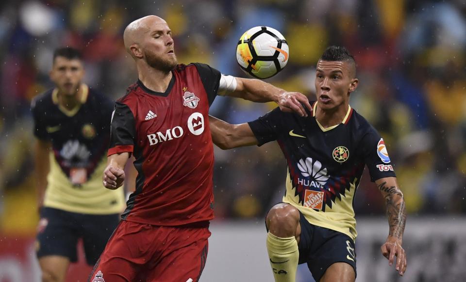 Michael Bradley (left) and Toronto FC look like overwhelming favorites to win the CONCACAF Champions League. (Getty)