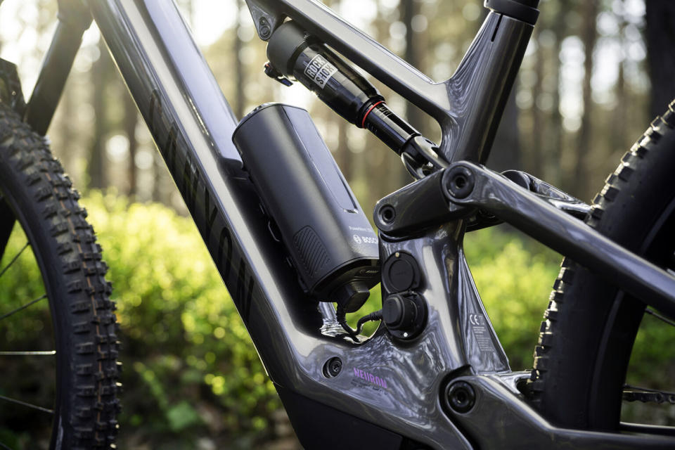 Canyon Neuron:ONfly lightweight 140mm carbon trail ebike with Bosch SX motor, range extender bottle battery