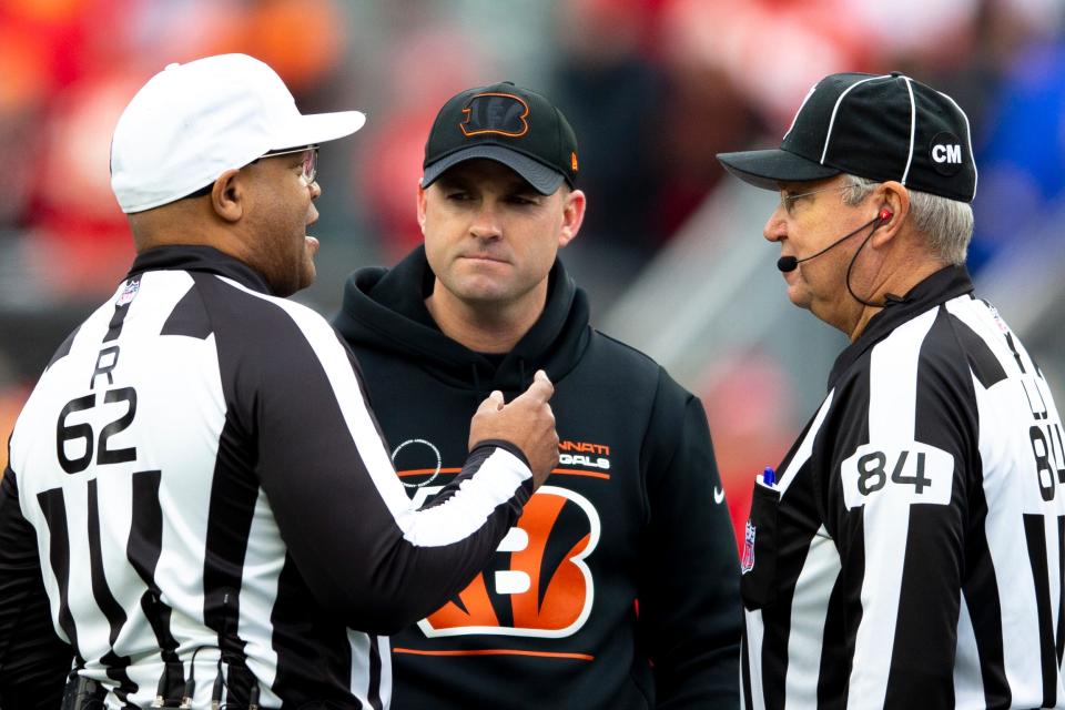 Cincinnati Bengals head coach Zac Taylor speaks with the refs during Week 17 last season against the Chiefs. In that game, his aggressive mentality was key.