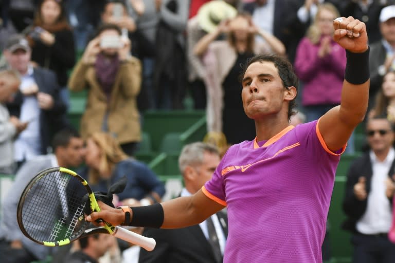 Spain's Rafael Nadal celebrates after winning against Britain's Kyle Edmund during the Monte Carlo ATP Masters Series tournament tennis match on April 19, 2017 in Monaco