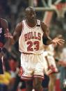 FILE PHOTO: Chicago Bulls' Michael Jordan shrugs after sinking a record sixth three-pointer during the first half of the first game of the NBA Finals against Portland Trail Blazers in Chicago.